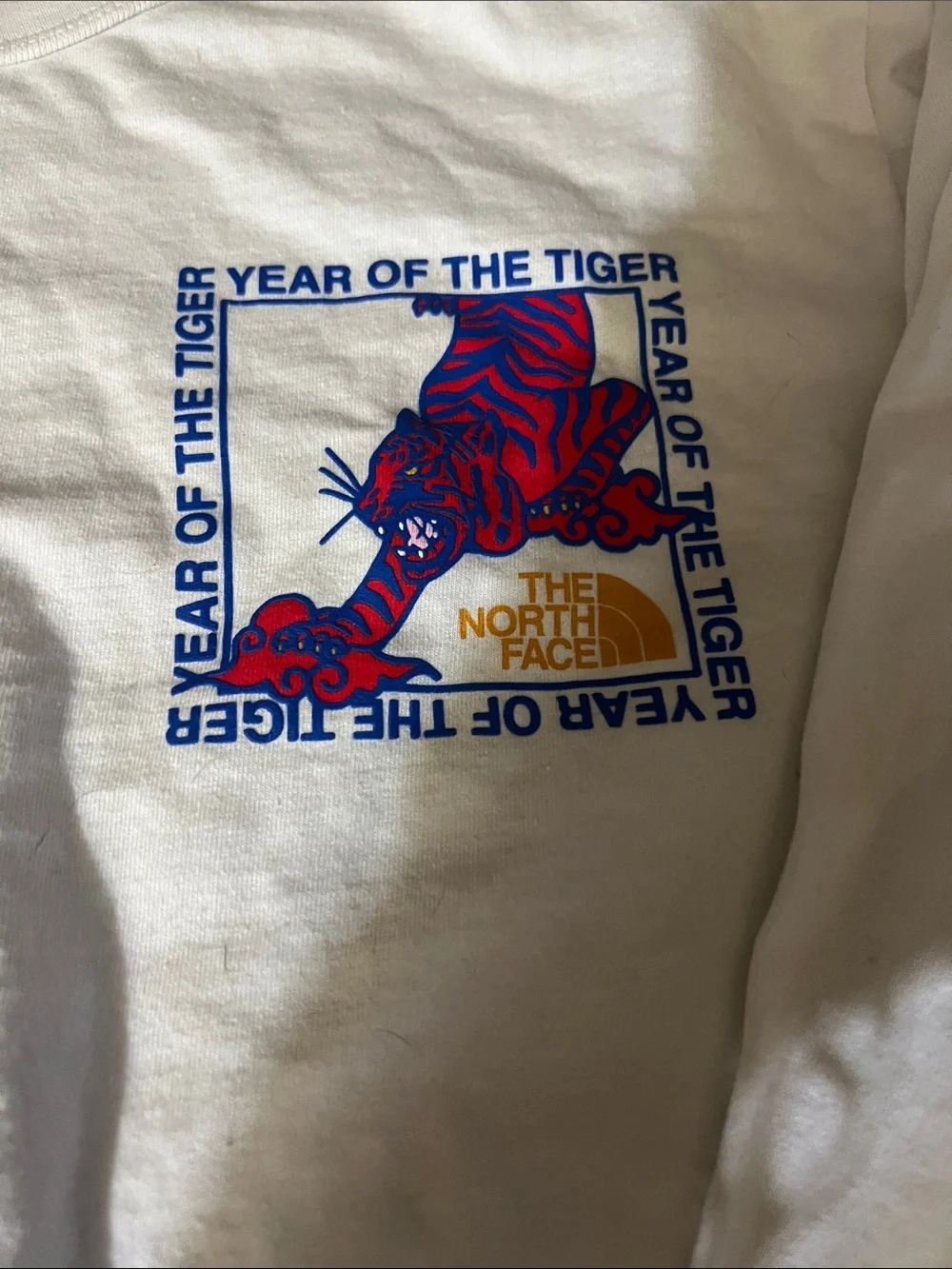 The North Face White Tee with Red & Blue Tiger Graphic